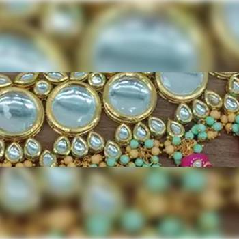 Traditional kundan choker necklace set with pearl string and matching earrings 2