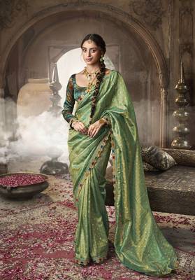 Designer green weaving soft tissue silk blend saree with designer blouse 1