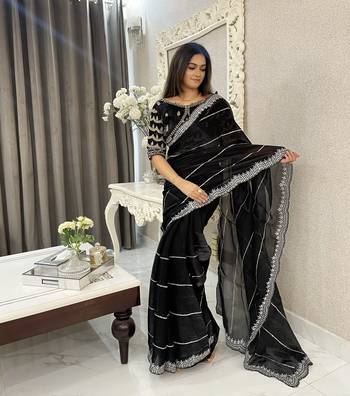 Black fancy jimmy chu embroidery work saree with embroidery stitched blouse 1