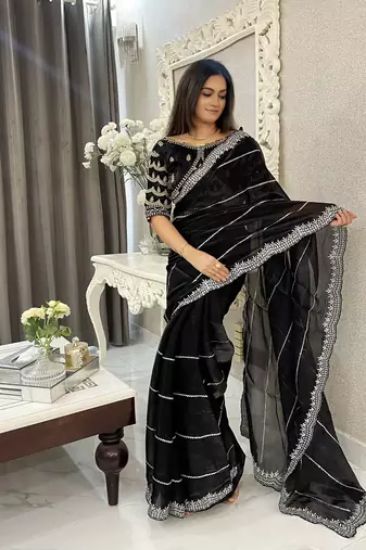 Black fancy jimmy chu embroidery work saree with embroidery stitched blouse