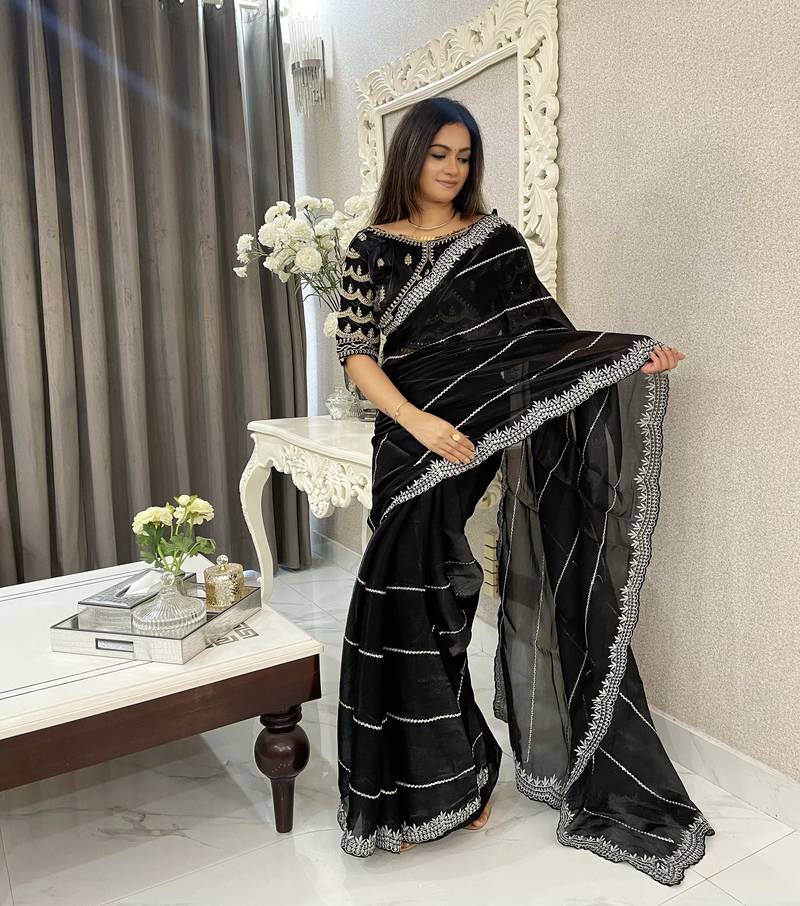 Black fancy jimmy chu embroidery work saree with embroidery stitched blouse