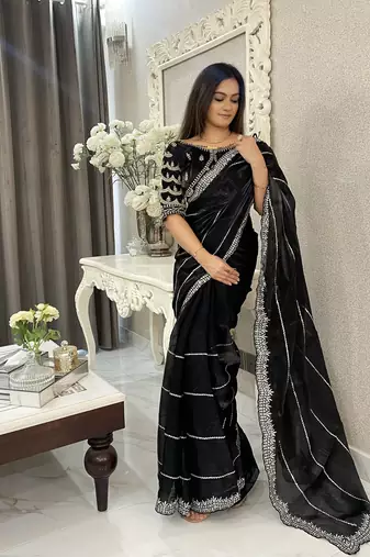 Black fancy jimmy chu embroidery work saree with embroidery stitched blouse