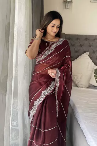 Maroon fancy jimmy chu embroidery work saree with embroidery stitched blouse