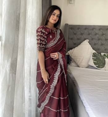Maroon fancy jimmy chu embroidery work saree with embroidery stitched blouse 3