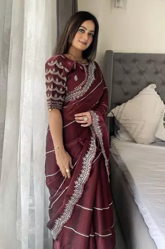Maroon fancy jimmy chu embroidery work saree with embroidery stitched blouse