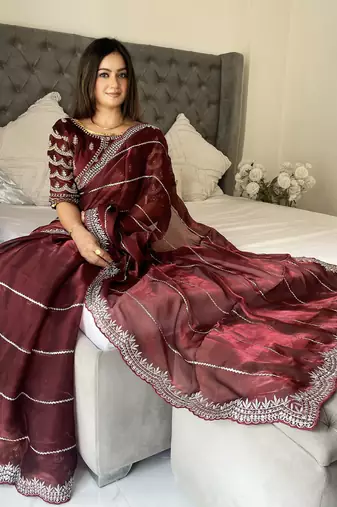 Maroon fancy jimmy chu embroidery work saree with embroidery stitched blouse