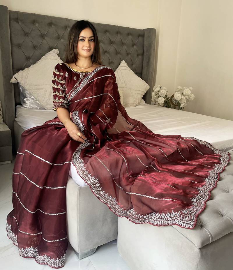 Maroon fancy jimmy chu embroidery work saree with embroidery stitched blouse
