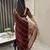 Maroon fancy jimmy chu embroidery work saree with embroidery stitched blouse