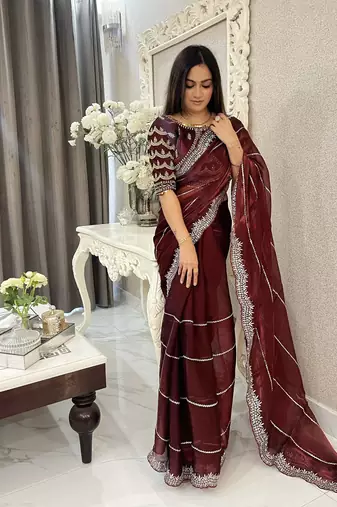 Maroon fancy jimmy chu embroidery work saree with embroidery stitched blouse