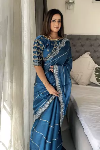 Light blue fancy jimmy chu embroidery work saree with embroidery stitched blouse