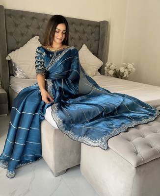 Light blue fancy jimmy chu embroidery work saree with embroidery stitched blouse 1