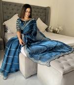 Light blue fancy jimmy chu embroidery work saree with embroidery stitched blouse