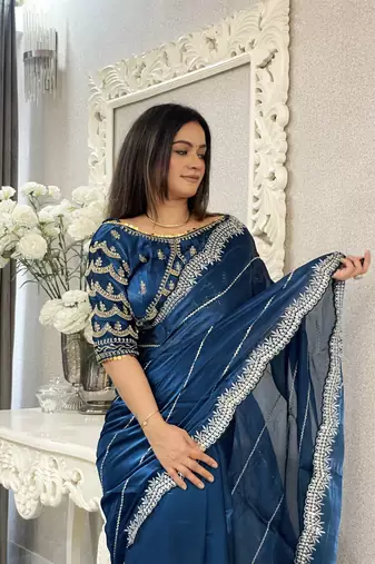 Light blue fancy jimmy chu embroidery work saree with embroidery stitched blouse