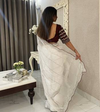 white fancy jimmy chu embroidery work saree with embroidery stitched blouse 4