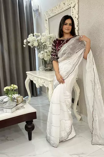 white fancy jimmy chu embroidery work saree with embroidery stitched blouse