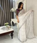 white fancy jimmy chu embroidery work saree with embroidery stitched blouse