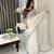 white fancy jimmy chu embroidery work saree with embroidery stitched blouse