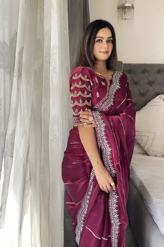 Purple fancy jimmy chu embroidery work saree with embroidery stitched blouse