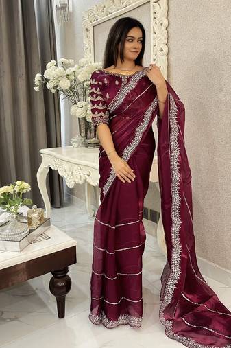 Purple fancy jimmy chu embroidery work saree with embroidery stitched blouse