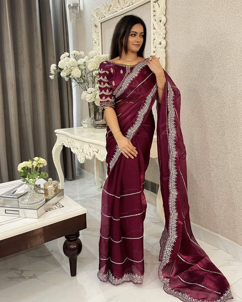 Purple fancy jimmy chu embroidery work saree with embroidery stitched blouse