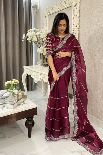 Purple fancy jimmy chu embroidery work saree with embroidery stitched blouse
