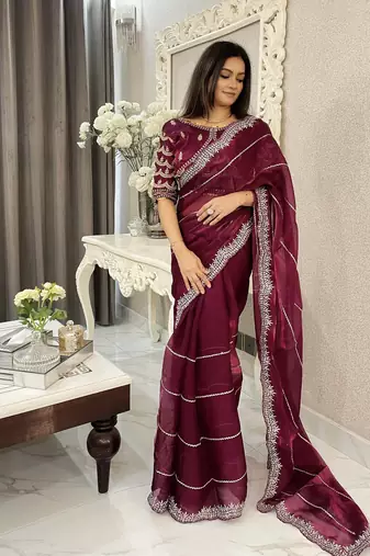 Purple fancy jimmy chu embroidery work saree with embroidery stitched blouse