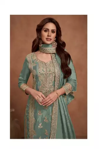 Light green heavy embroidery semi stitched silk wedding palazzo suits