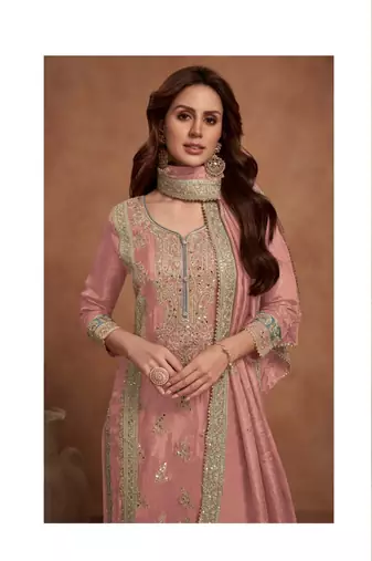 Light peach heavy embroidery semi stitched silk wedding palazzo suits
