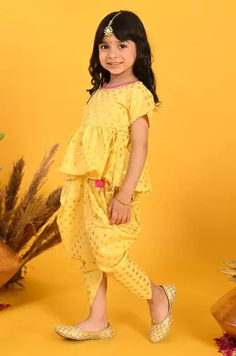 Saka designs yellow and gold jhabla & dhoti with pom pom and lace detalling