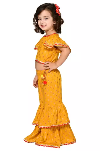Saka designs girl mustard top and sharara with lace detailing and tassels