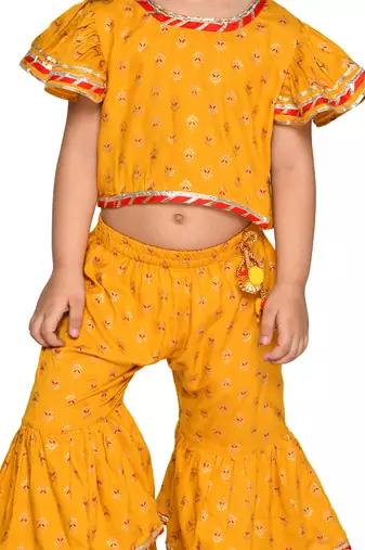 Saka designs girl mustard top and sharara with lace detailing and tassels