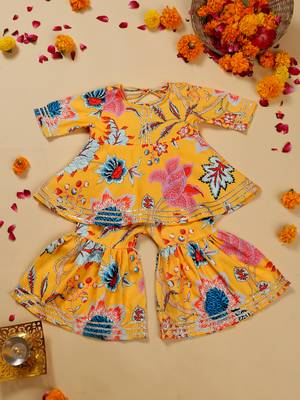 Saka designs floral yellow sharara kurta for girls 1