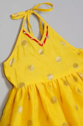Saka designs yellow and red halter neck dhoti jhabla