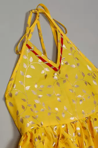 Saka designs yellow and red halter neck dhoti jhabla