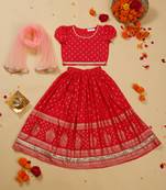 Saka designs golden foil printed rayon dark peach lehenga choli with dupatta