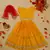 Saka designs golden foil printed rayon yellow lehenga choli with dupatta