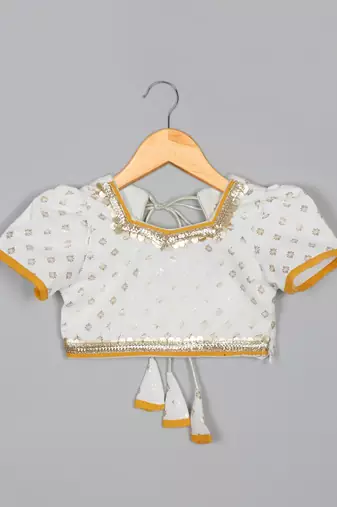 Saka designs girls foil printed lacework white choli with mustard lehenga choli