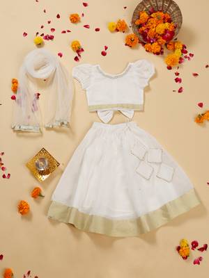 Saka designs white lehenga choli with dupatta adorned with golden border for girls 1