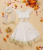 Saka designs white lehenga choli with dupatta adorned with golden border for girls