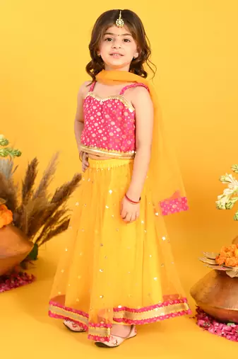 Saka designs orange lehenga with sequence work and poly jaquard choli in magenta