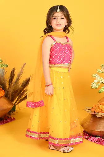 Saka designs orange lehenga with sequence work and poly jaquard choli in magenta
