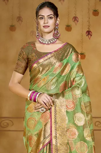 Sangam prints green organza woven work traditional saree