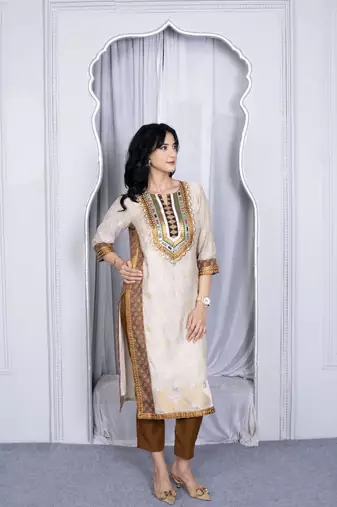 Nikhaa embroidered beige silk straight cut kurta &