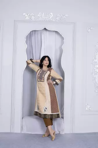 Nikhaa embroidered beige silk a line kurta &