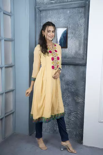 Nikhaa embroidered beige georgette a line kurta &
