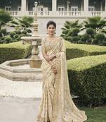 Cream tissue embroidered stone work designer saree
