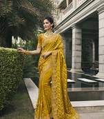 Mustard tissue embroidered stone work designer saree