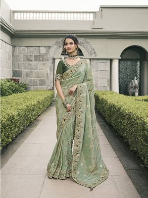 Sea green tissue embroidered saree 1
