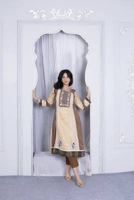 Nikhaa embroidered beige silk a line kurta & pants set 1