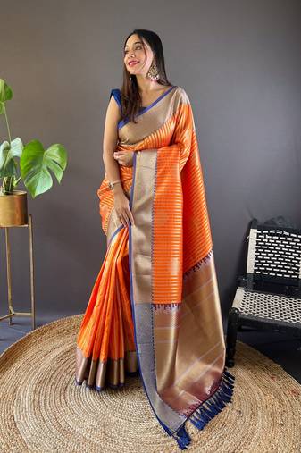 Orange banarasi silk saree with weaving gold zari and contrast blouse piece